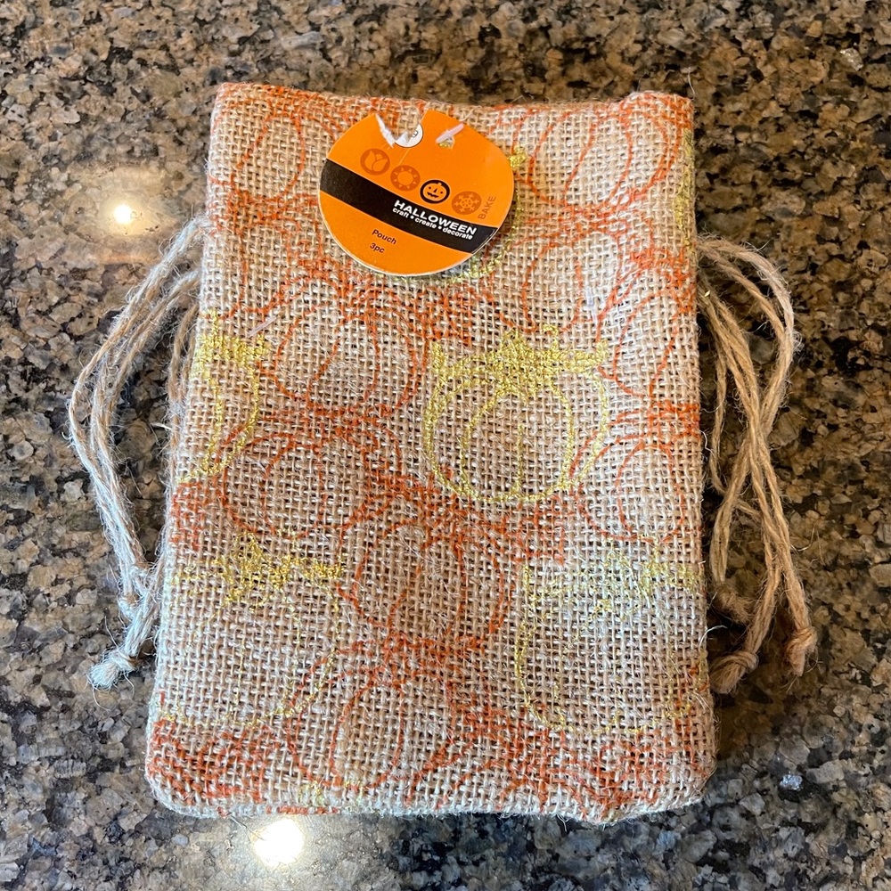 Set of 3 burlap pumpkin draw string pouches.  NWT